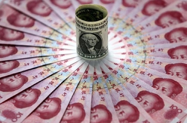 Рост доллара усилит давление на юань