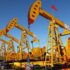 Доллар слабо дорожает к мировым валютам